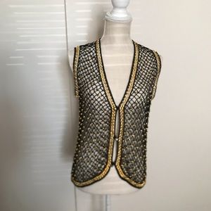Fancy mesh vest in black thread. with golden pieces S/M size
